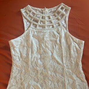 White cutout detailed dress with beading